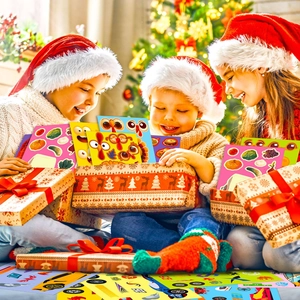 Kids opening gift box with Thanksgiving turkey and autumn harvest themed stickers