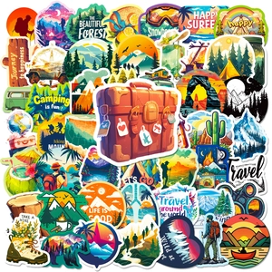 Detailed view of waterproof outdoor adventure stickers with mountains and camping motifs