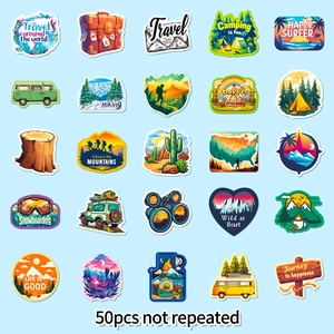 Flat lay of 50pcs waterproof outdoor adventure stickers with camping and hiking designs