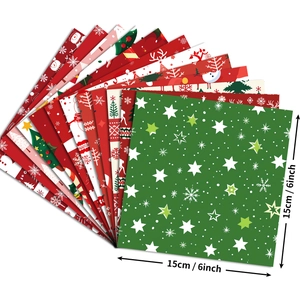 Detail of 6-inch Christmas scrapbook paper featuring snowman and reindeer patterns