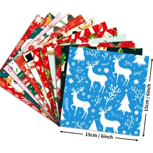 Christmas themed patterned craft paper with elk and snowman designs in 6x6 inch size