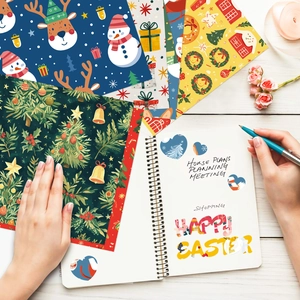 Macro de 12 feuilles de papier de Noël festif avec motifs de rennes et bonhommes de neige