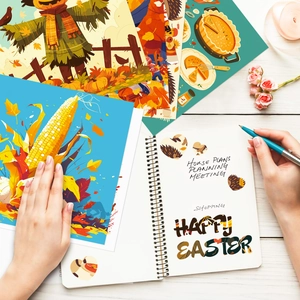 Detail of harvest scrapbooking stickers with scarecrow and pumpkin on wooden table