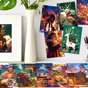 Gros plan de 50 cartes de décoration de Noël avec rennes festifs et flocons de neige