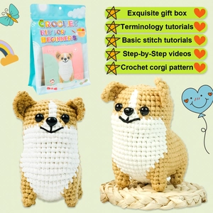 DIY haakpakket voor beginners met twee schattige Corgi knuffels en een blauwe cadeautas