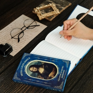 Classic Mona Lisa oil painting notebook with deep blue vintage hard cover and gold edges