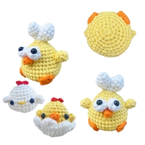 DIY crochet kit for handmade yellow and white chicken plush toys with bow and shell details