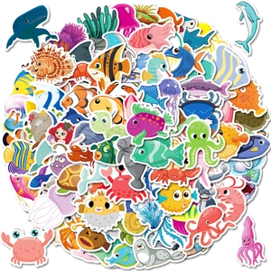 Detailed pile of colorful ocean creature stickers featuring whales and dolphins