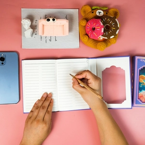 Detailed view of the princess theme journal set with purple lined notebook and gift box