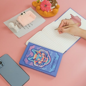 Chinoiserie hardbound notebook with purple dragon illustration and lined pages