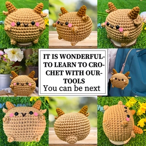 Macro detail of handmade crochet sheep keychain showing knit texture and cute brown round body