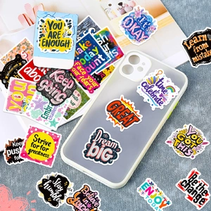 Close-up of inspirational quotes stickers on a phone case with creative DIY designs