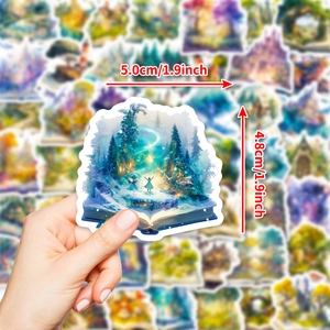 Fantasy magic book cartoon sticker 5cm size shown on hand for decoration