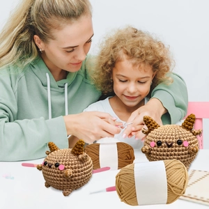 DIY crochet kit for cute lamb charms showing yarn rolls and ergonomic crochet hook tools