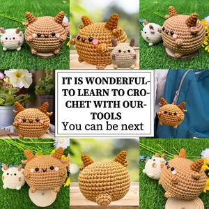Detailed view of two cute crochet lamb dolls hanging on a blue backpack as DIY charms