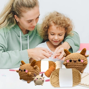 DIY crochet kit for kids showing cute sheep plushies and colorful yarn balls