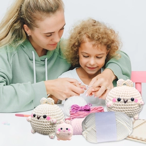 Detailed DIY crochet kit for beginners showing colorful yarn and cute rabbit figurines