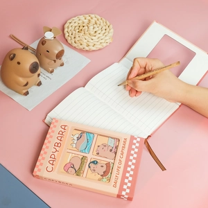 Pink Capybara stationery set featuring an A5 notebook with charming hand-drawn illustrations
