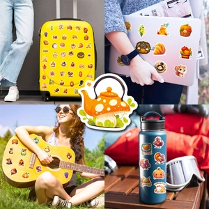 Waterproof Thanksgiving stickers shown on suitcase, laptop, guitar, and water bottle
