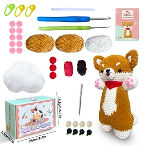 DIY crochet kit for beginners with yarn and tools to make a cute corgi dog plush charm