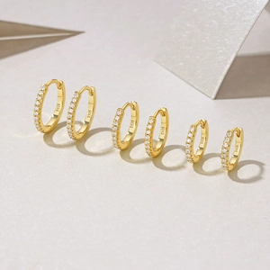 Three pairs of S925 sterling silver gold-plated hoop earrings with micro-set zircon accents