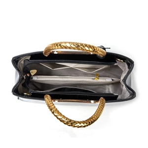 Internal view of handbag featuring grey herringbone lining and gold braided handles