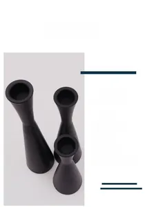 Three-piece set of matte black minimalist candle holders in varying heights for home decor