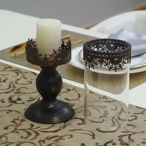 Vintage black metal candlestick with crown lace trim and clear glass hurricane cover