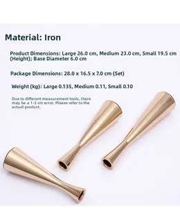 Three-piece rose gold iron candle holder set in varied heights with a mirror finish