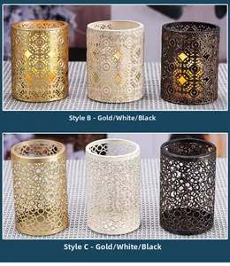 Detalle de portavelas metálicos con diseños calados en color oro negro blanco para mesa