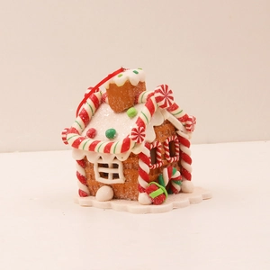 Lebkuchenhaus Weihnachtsanhänger mit Zuckerstangen und rotem Band zur Dekoration