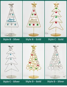 Details der Weihnachtsbaum-Modelle B C D aus Eisen mit bunten Glocken in Gold und Silber