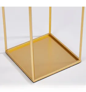 Detail of hand-polished gold iron candle holder base with non-slip protective bottom layer