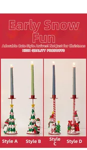Details von vier europäischen Weihnachts-Kerzenhaltern mit festlichen Figuren aus Eisen
