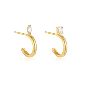 Macro view of C-shaped gold-plated earrings with marquise and oval cubic zirconia