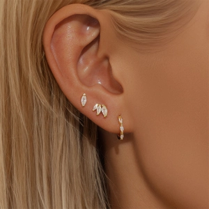 Detailed close-up of 18K gold S925 silver ear set with marquise-cut zircon stones