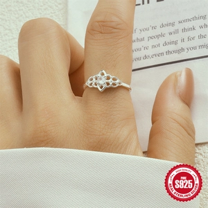 Elegant S925 sterling silver plum blossom ring with sparkling zircon stone on finger