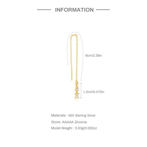 Dettaglio di orecchini a nappa in argento 925 con scintillanti pietre di zircone AAAAA