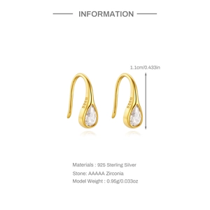 Detail of S925 sterling silver stamp on golden teardrop earrings with AAAAA zircon