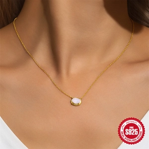 S925 sterling silver gold necklace with oval pink opal gemstone pendant worn by model