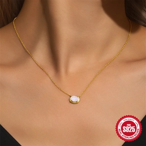S925 sterling silver gold necklace with oval pink opal gemstone worn on neck