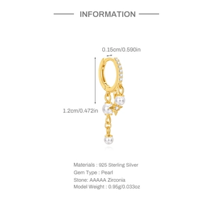Detailed view of single S925 sterling silver gold hoop with pearls and star zircon pendant