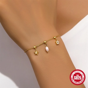 Bracelet S925 argent avec pendentifs étoile de mer et perle en finition dorée chic