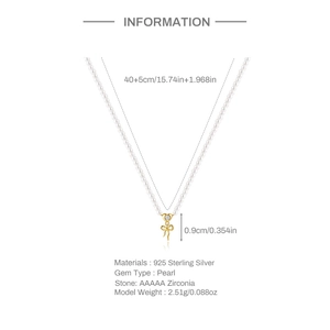 Detailansicht der Perlenkette mit goldenem 925er Silber Schleifenanhänger und Zirkon