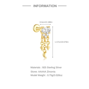Macro detail of gold S925 silver stud earring with pink opal and star moon fringe