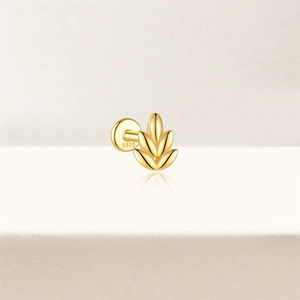 Detail of S925 sterling silver stamp on the back of golden leaf-shaped tassel stud earrings