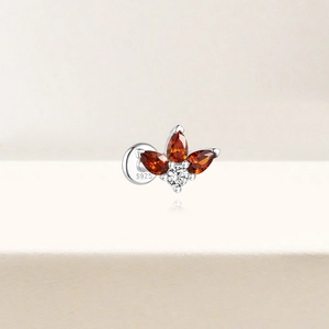 Close-up of S925 silver flat back earring with orange and white floral gemstones