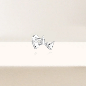 Macro shot of 925 sterling silver stamp on threaded flat back labret stud with zircons