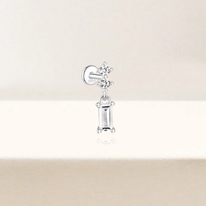 Macro shot of S925 sterling silver studs with zircon gemstones and flat back post