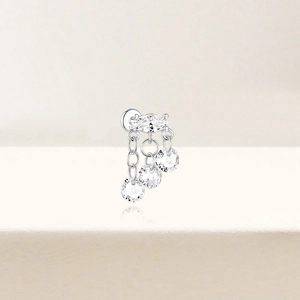 Close-up of S925 sterling silver tassel earring with sparkling cubic zirconia stones